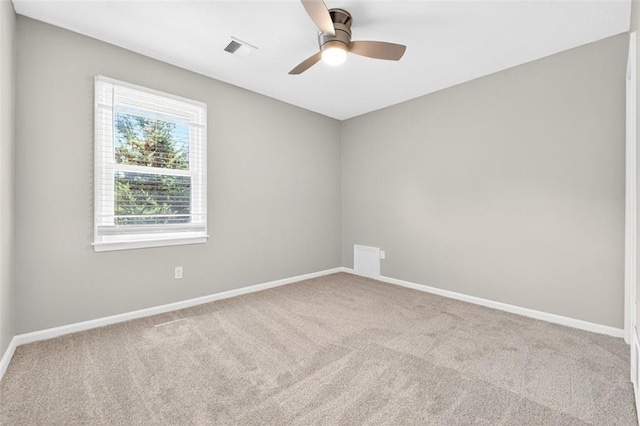 2623 W 131st St, Olathe, KS 66061 - empty room featuring carpet floors and a ceiling fan