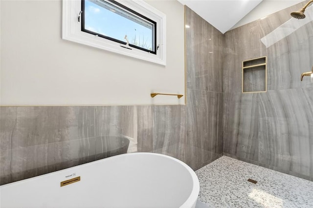 2623 W 131st St, Olathe, KS 66061 - full bath featuring a freestanding bath, tiled shower, and lofted ceiling