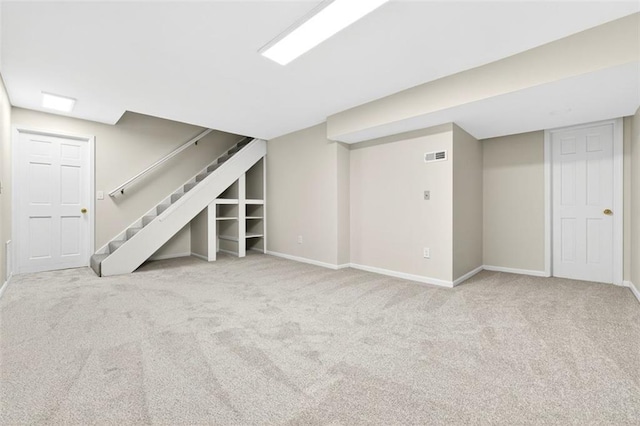 2623 W 131st St, Olathe, KS 66061 - finished below grade area with carpet floors and stairs