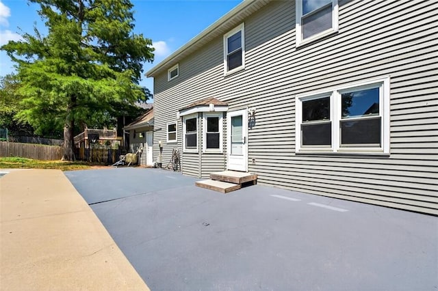 2623 W 131st St, Olathe, KS 66061 - rear view of house with a patio area