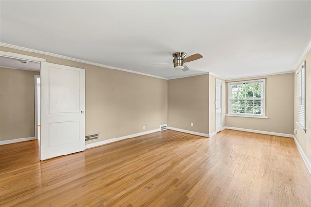 1296 W 72nd Ter, Kansas City, MO 64114 - spare room featuring ceiling fan, light wood-type flooring, and crown molding
