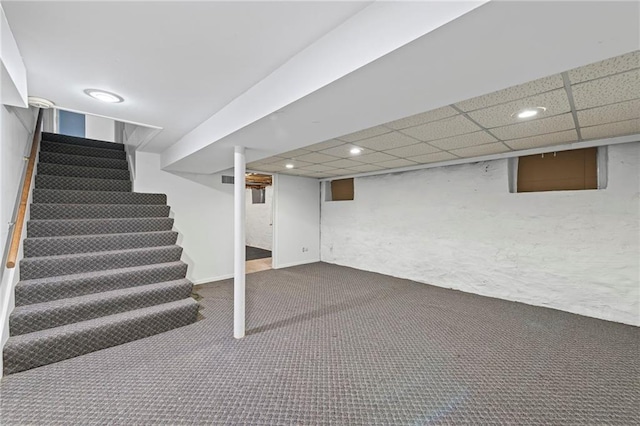 1296 W 72nd Ter, Kansas City, MO 64114 - finished basement with carpet floors, stairway, a drop ceiling, and recessed lighting