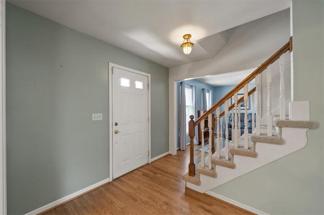 12147 Farley St, Overland Park, KS 66213 - entryway with stairway and wood finished floors