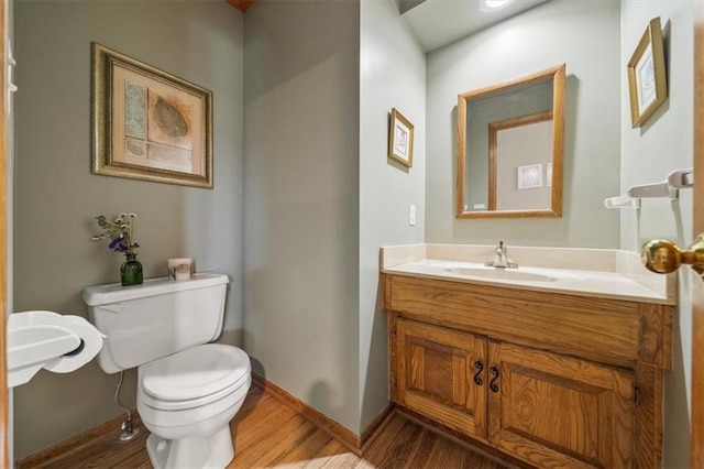 12147 Farley St, Overland Park, KS 66213 - half bathroom featuring wood finished floors and vanity