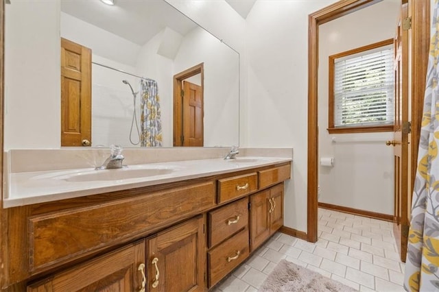 12147 Farley St, Overland Park, KS 66213 - bathroom featuring double vanity, tile patterned floors, and curtained shower