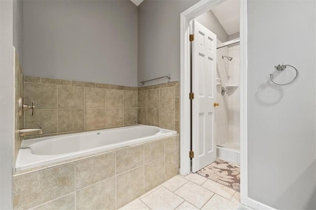 12147 Farley St, Overland Park, KS 66213 - full bath with a bath, a stall shower, and tile patterned floors