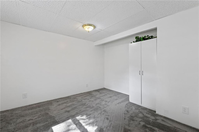811 S Hickory St, Ottawa, KS 66067 - carpeted spare room with a paneled ceiling