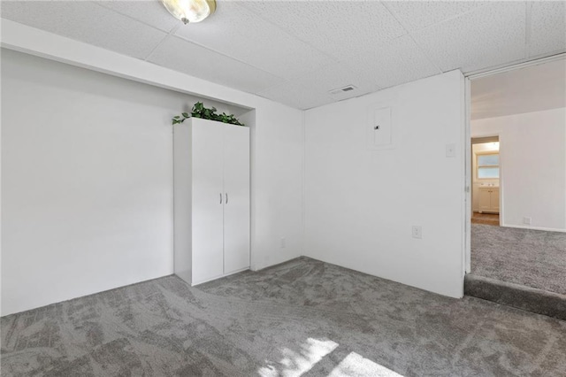 811 S Hickory St, Ottawa, KS 66067 - carpeted empty room with electric panel