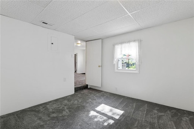 811 S Hickory St, Ottawa, KS 66067 - spare room with carpet floors and a drop ceiling