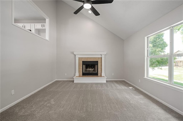 32625 W 174th St, Gardner, KS 66030 - unfurnished living room featuring carpet floors, a fireplace, vaulted ceiling, plenty of natural light, and ceiling fan