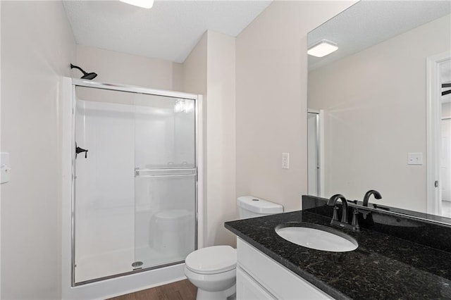 32625 W 174th St, Gardner, KS 66030 - bathroom featuring a shower stall, vanity, and wood finished floors