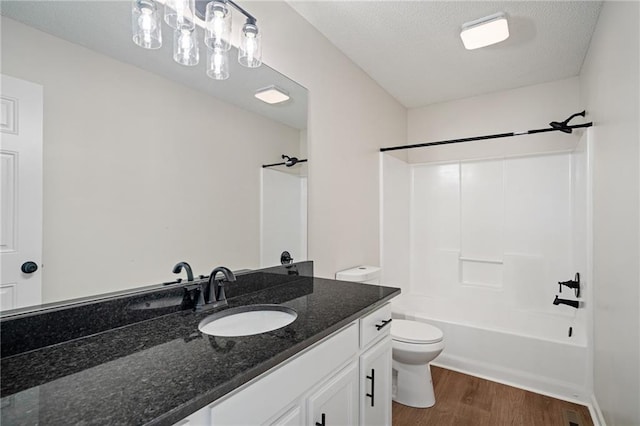 32625 W 174th St, Gardner, KS 66030 - bathroom with wood finished floors, vanity, and shower / tub combination