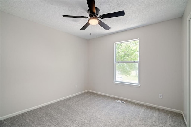 32625 W 174th St, Gardner, KS 66030 - carpeted spare room featuring a textured ceiling and a ceiling fan