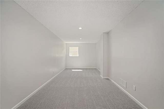 32625 W 174th St, Gardner, KS 66030 - carpeted empty room featuring a textured ceiling and recessed lighting
