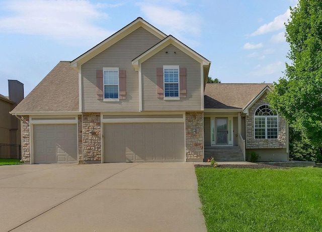701 Tomahawk Ct, Smithville, MO 64089 - view of front of property featuring stone siding, concrete driveway, a front yard, an attached garage, and a shingled roof