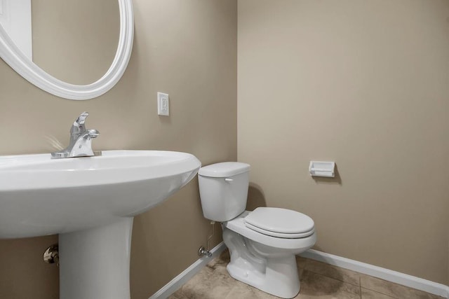 701 Tomahawk Ct, Smithville, MO 64089 - bathroom with toilet and tile patterned floors
