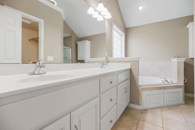 701 Tomahawk Ct, Smithville, MO 64089 - full bath with double vanity, lofted ceiling, a garden tub, tile patterned flooring, and a shower with door