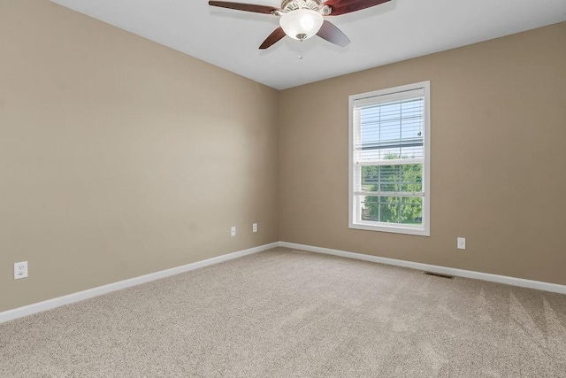 701 Tomahawk Ct, Smithville, MO 64089 - spare room featuring carpet flooring and a ceiling fan