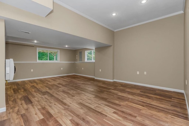 701 Tomahawk Ct, Smithville, MO 64089 - spare room with ornamental molding, wood finished floors, and recessed lighting