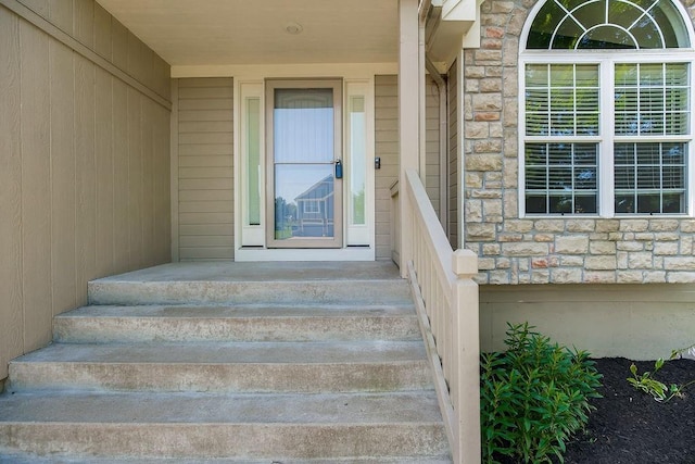 701 Tomahawk Ct, Smithville, MO 64089 - entrance to property featuring stone siding