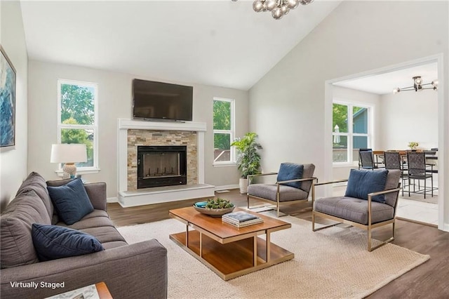 18201 W 157th Ter, Olathe, KS 66062 - living room with a chandelier, plenty of natural light, and high vaulted ceiling