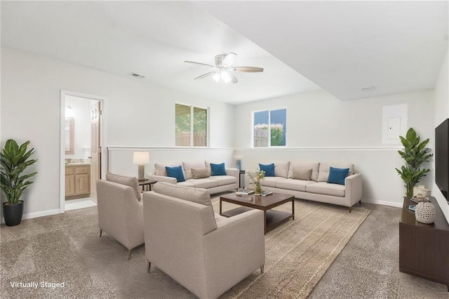 18201 W 157th Ter, Olathe, KS 66062 - living room featuring ceiling fan and light colored carpet