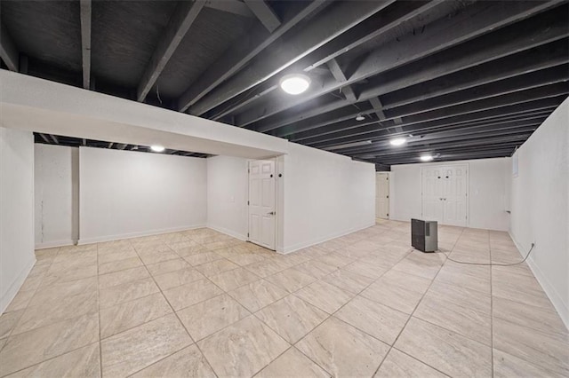 7 Hi View Ridge Dr, Archie, MO 64725 - finished below grade area featuring tile patterned floors and baseboards