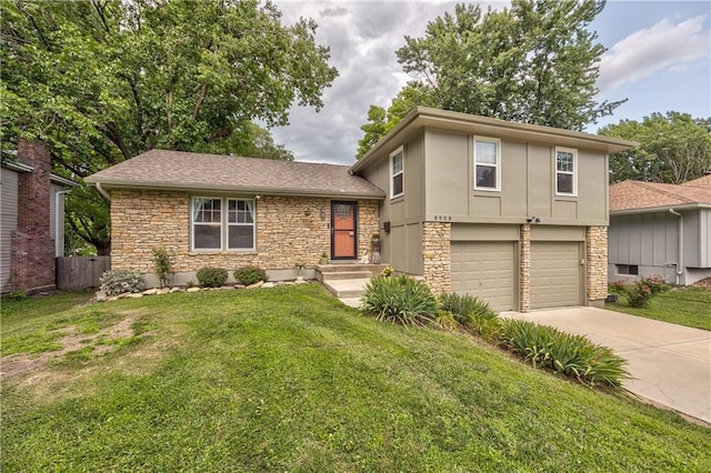 8908 W 95th Ter, Overland Park, KS 66212 - split level home with stone siding, driveway, an attached garage, and a shingled roof