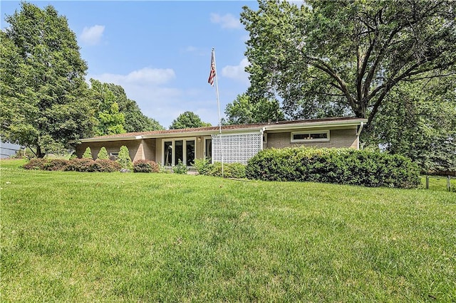 5919 N Adrian Ter, Kansas City, MO 64152 - view of front of home with a front yard