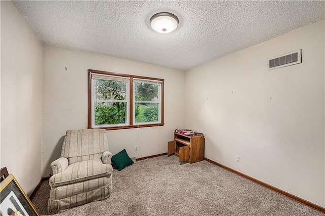 5919 N Adrian Ter, Kansas City, MO 64152 - sitting room with carpet floors and a textured ceiling