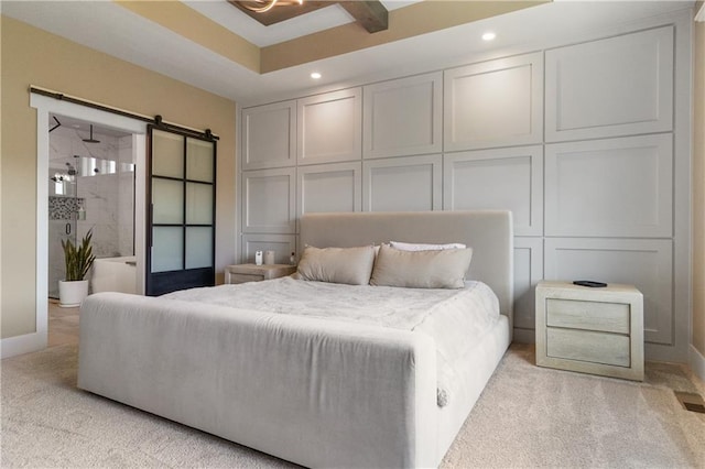 1113 Hummingbird Ct, Greenwood, MO 64034 - bedroom with light carpet, recessed lighting, and a barn door