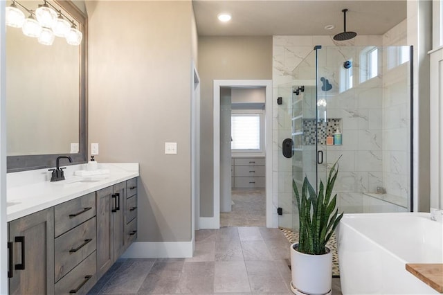 1113 Hummingbird Ct, Greenwood, MO 64034 - bathroom featuring double vanity, a stall shower, and a freestanding bath
