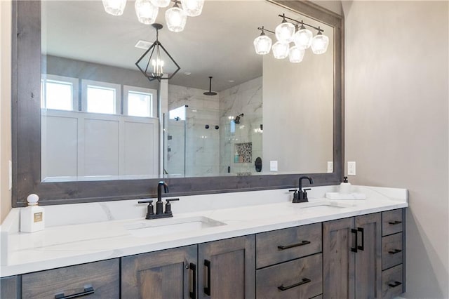 1113 Hummingbird Ct, Greenwood, MO 64034 - full bath with double vanity, a shower stall, and a chandelier