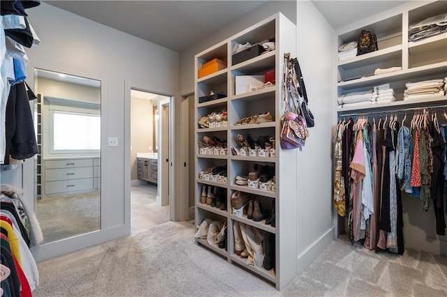 1113 Hummingbird Ct, Greenwood, MO 64034 - spacious closet featuring carpet floors