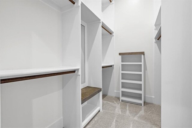 3932 SW Flinkrock Dr, Lees Summit, MO 64082 - spacious closet with carpet flooring