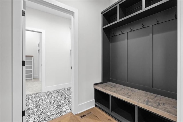 3932 SW Flinkrock Dr, Lees Summit, MO 64082 - mudroom featuring baseboards