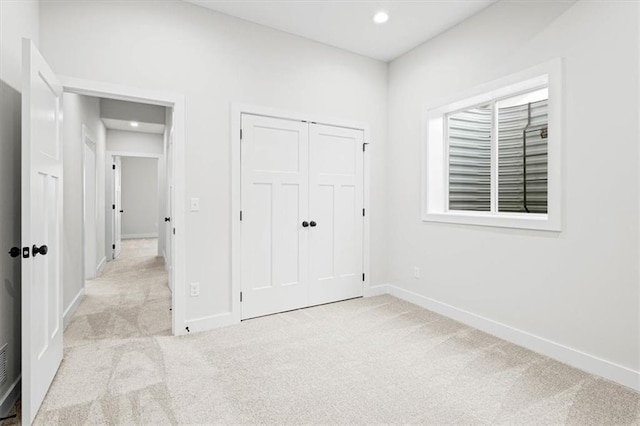 3932 SW Flinkrock Dr, Lees Summit, MO 64082 - unfurnished bedroom with carpet flooring, recessed lighting, and a closet