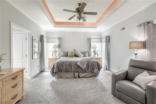 1021 SW Summit Falls Dr, Lees Summit, MO 64081 - bedroom featuring a raised ceiling, light colored carpet, ornamental molding, and ceiling fan