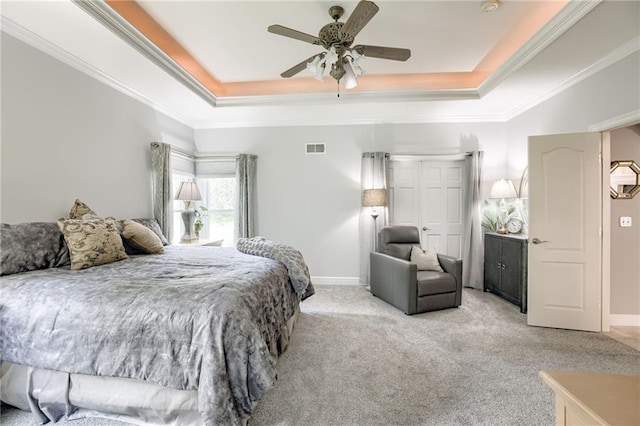1021 SW Summit Falls Dr, Lees Summit, MO 64081 - bedroom with a tray ceiling, light carpet, ornamental molding, and ceiling fan