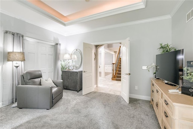 1021 SW Summit Falls Dr, Lees Summit, MO 64081 - living area featuring ornamental molding, light colored carpet, stairway, and arched walkways