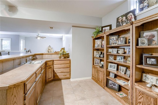 1021 SW Summit Falls Dr, Lees Summit, MO 64081 - bathroom with ceiling fan and tile patterned flooring