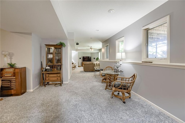 1021 SW Summit Falls Dr, Lees Summit, MO 64081 - living area featuring carpet and ceiling fan