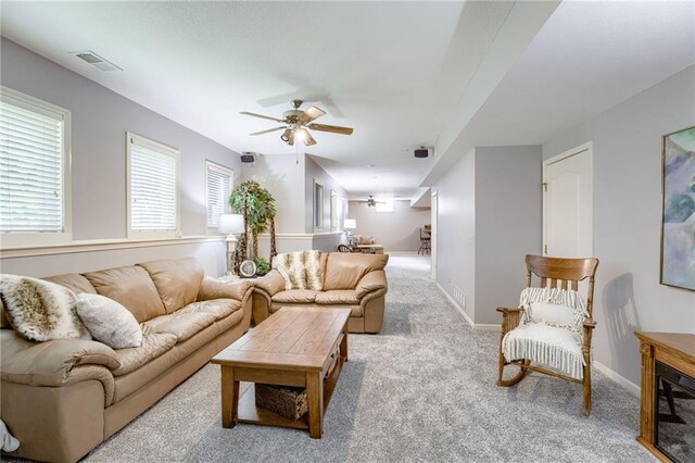 1021 SW Summit Falls Dr, Lees Summit, MO 64081 - living area with ceiling fan and carpet floors