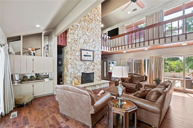 402 Lees Circle Dr, Fort Scott, KS 66701 - living area featuring a fireplace, dark wood finished floors, ceiling fan, a towering ceiling, and recessed lighting