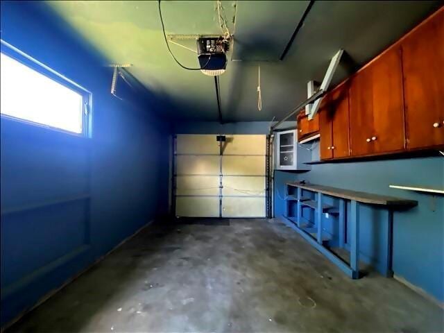 4738 Norton Cir, Kansas City, MO 64128 - garage with a garage door opener