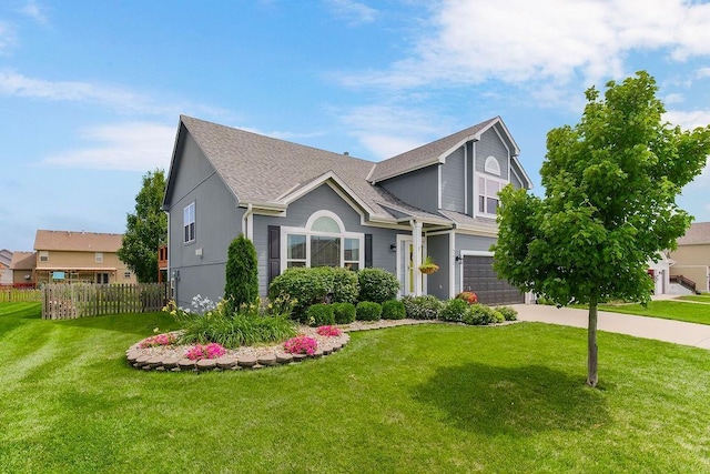 1912 Sequoia Dr, Raymore, MO 64083 - view of front of property with a garage, driveway, and roof with shingles