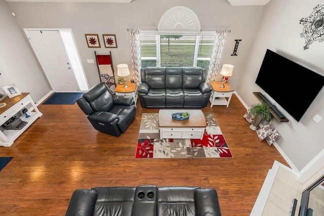 1912 Sequoia Dr, Raymore, MO 64083 - living room with wood finished floors and baseboards