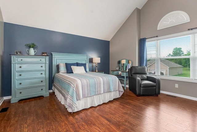 1912 Sequoia Dr, Raymore, MO 64083 - bedroom featuring dark wood-style flooring and high vaulted ceiling