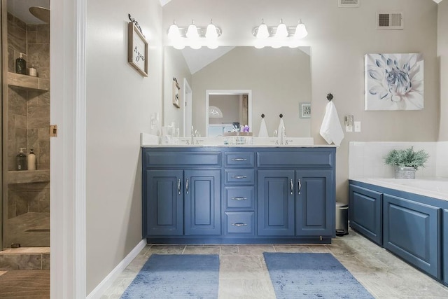 1912 Sequoia Dr, Raymore, MO 64083 - full bath featuring double vanity, a stall shower, and vaulted ceiling