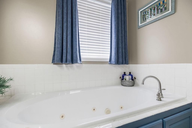 1912 Sequoia Dr, Raymore, MO 64083 - bathroom with a jetted tub